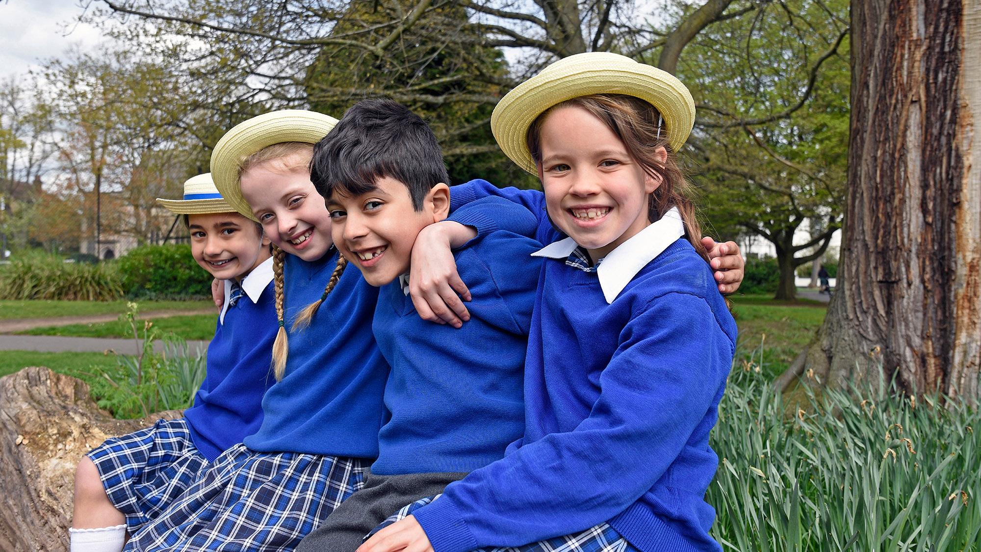 Students sat on a branch