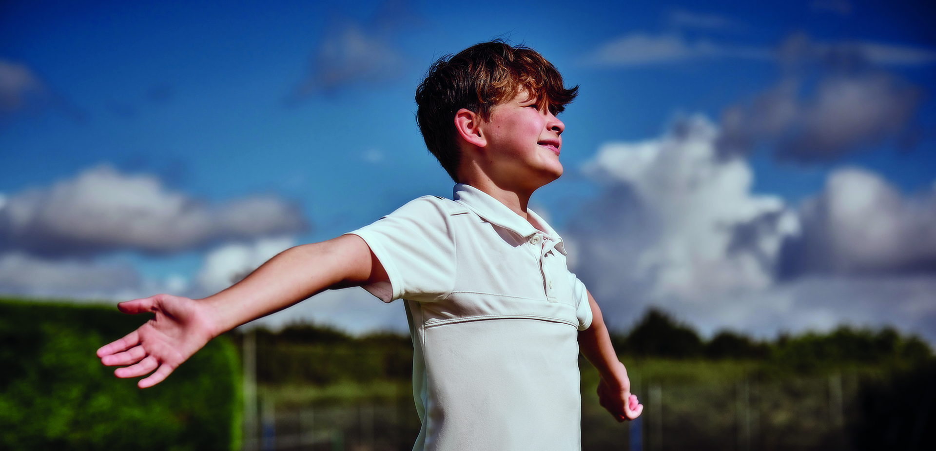 boy running in the sun