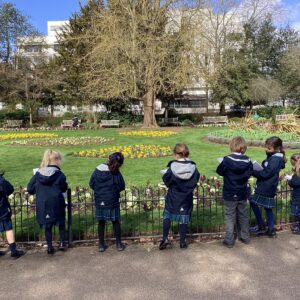 students stood around a park